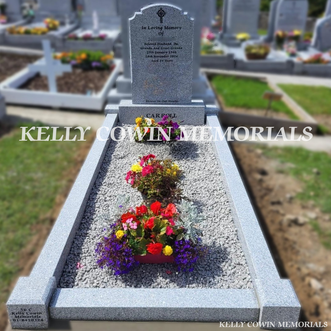 Front view of grey granite Top 9 headstone with black inscription in Balrothery Cemetery
