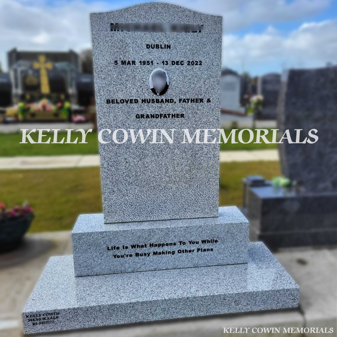 Front view of grey granite OG headstone with black inscription and oval ceramic photograph in Dardistown Cemetery Dublin