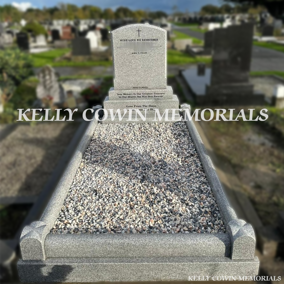 Front view of Grey Granite polished boulder headstone on sub-base, base and plinth in Balgriffin Cemetery Dublin