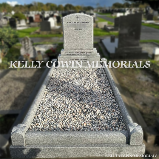 Front view of Grey Granite polished boulder headstone on sub-base, base and plinth in Balgriffin Cemetery Dublin