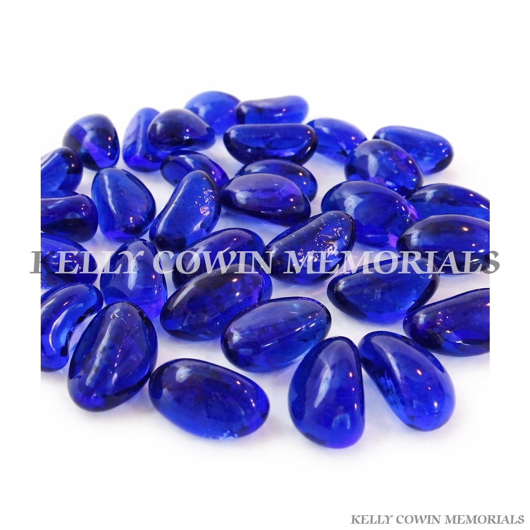 Ink blue glass pebbles for grave memorial supplied in Dublin by Kelly Cowin Memorials with nationwide delivery across Ireland.