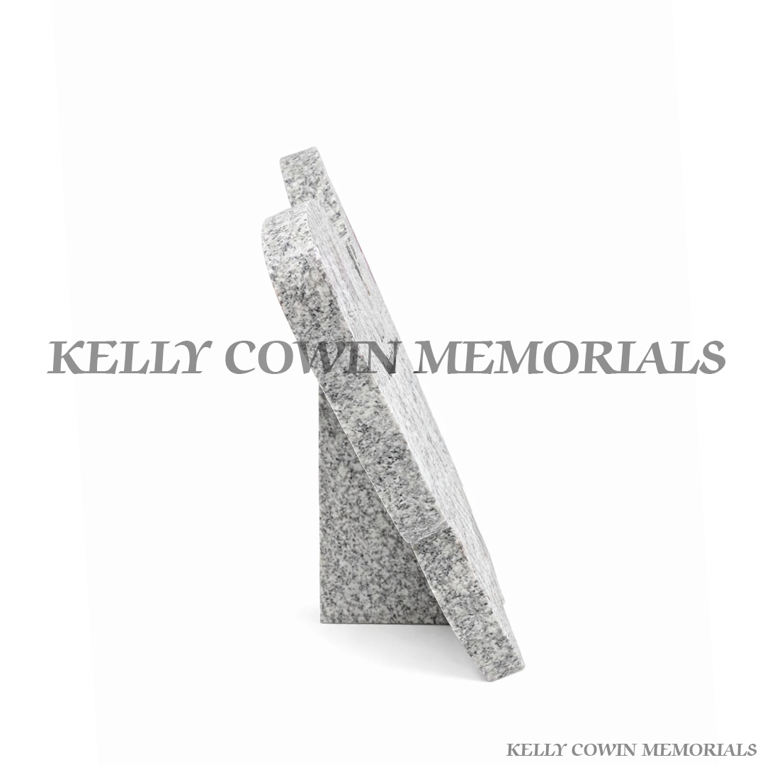 Grey granite butterfly shaped memorial plaque side view with personalised engraved inscription by Kelly Cowin Memorials Dublin Ireland