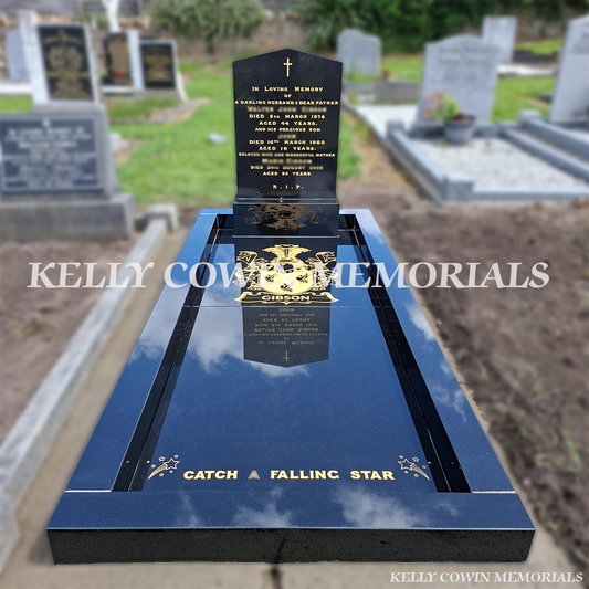 Black Granite Apex headstone with full polished granite floor, granite kerbing, gold leaf inscription and personalised engraved artwork installed in Kilbarrack Cemetery by Kelly Cowin Memorials.
