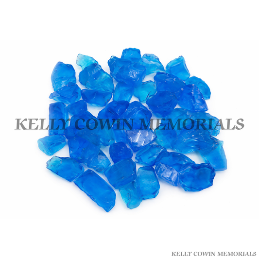 Blue glass grave chippings supplied in Dublin by Kelly Cowin Memorials with nationwide delivery across Ireland.