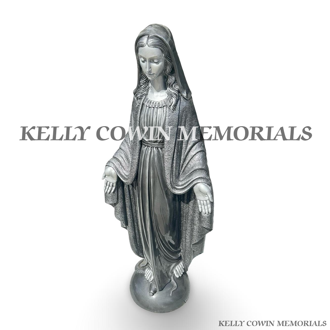 Close-up of detailed large silver Our Lady memorial statue