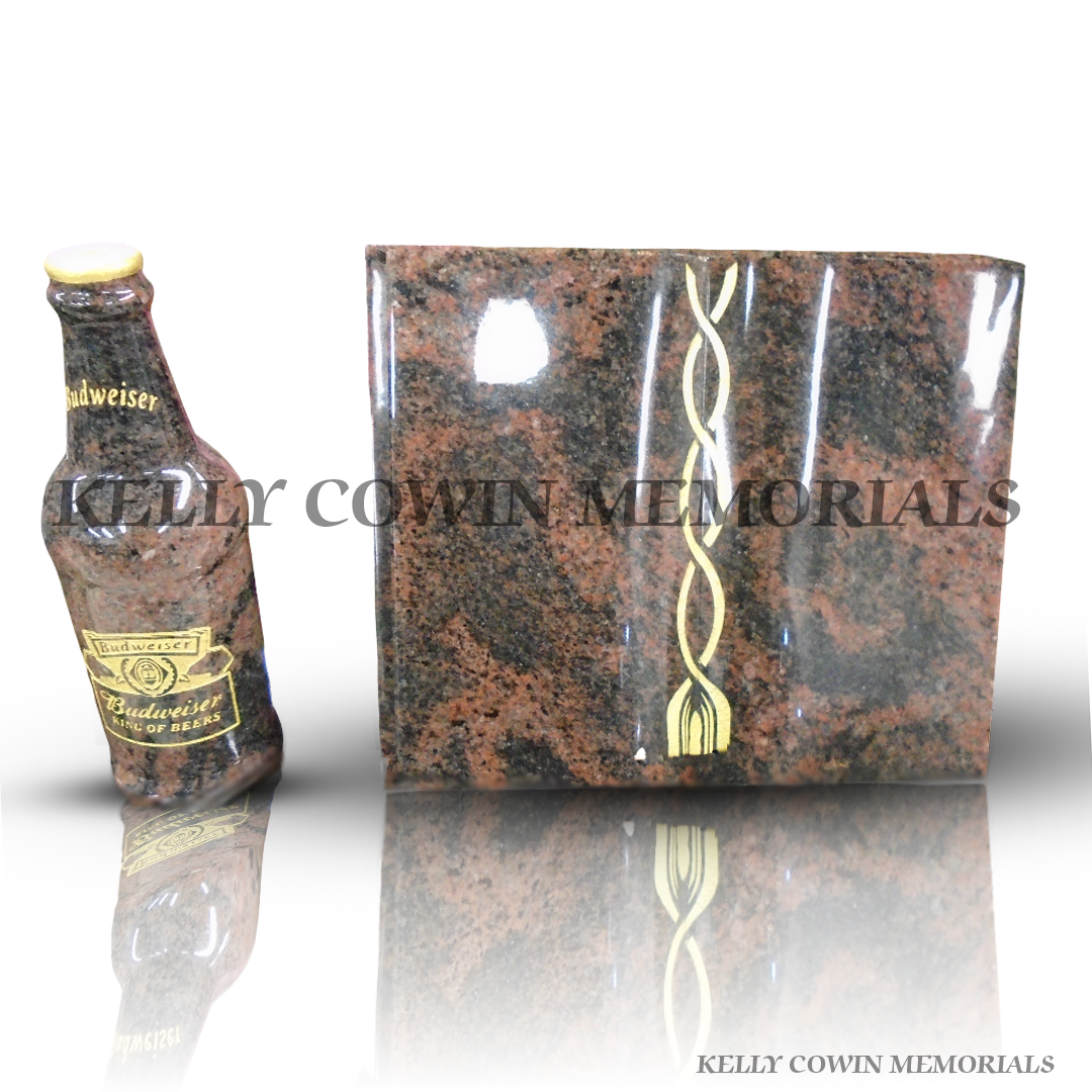 Pandora granite memorial book plaque with gold design and matching granite bottle ornament.