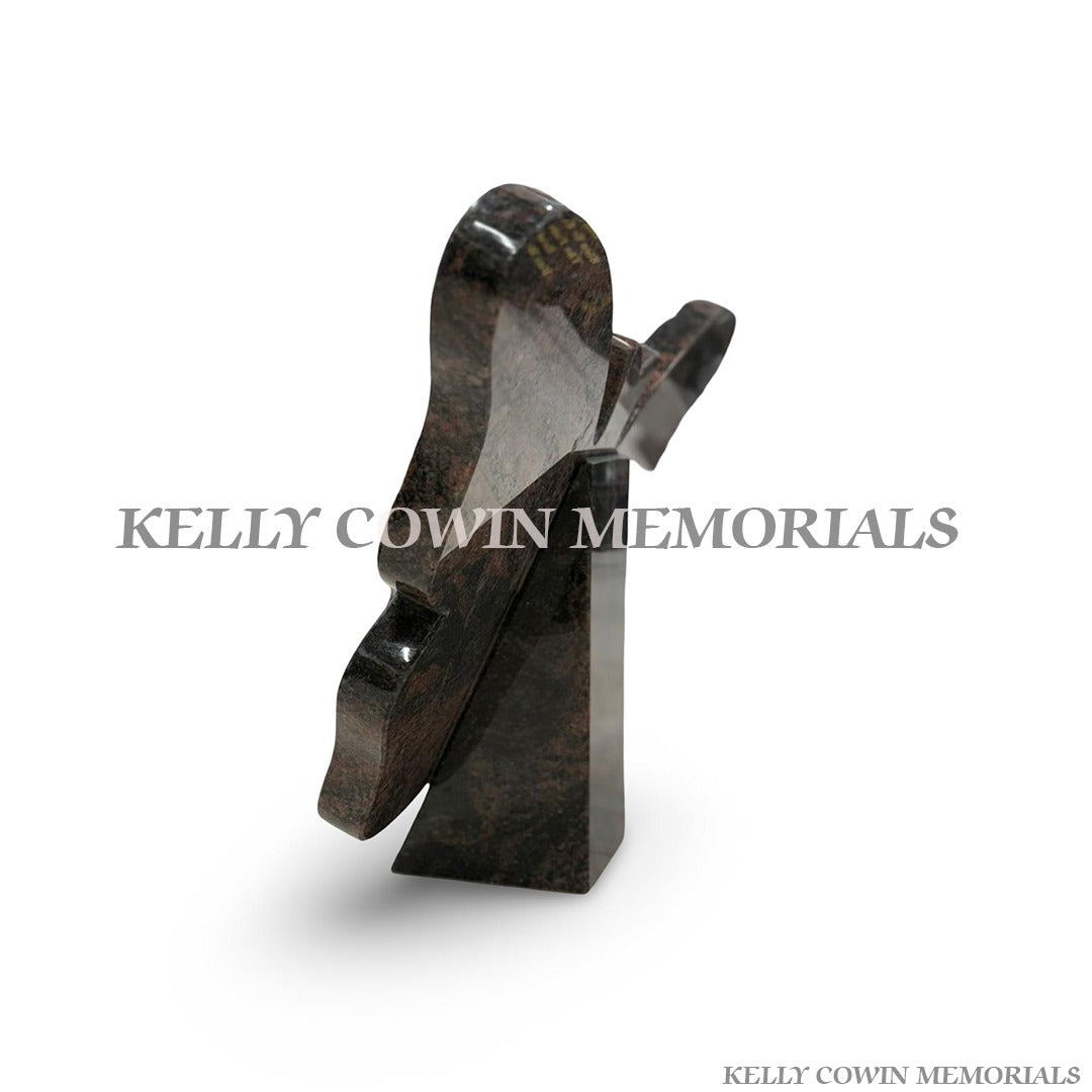 Side view of polished Pandora granite memorial plaque with engraved butterflies