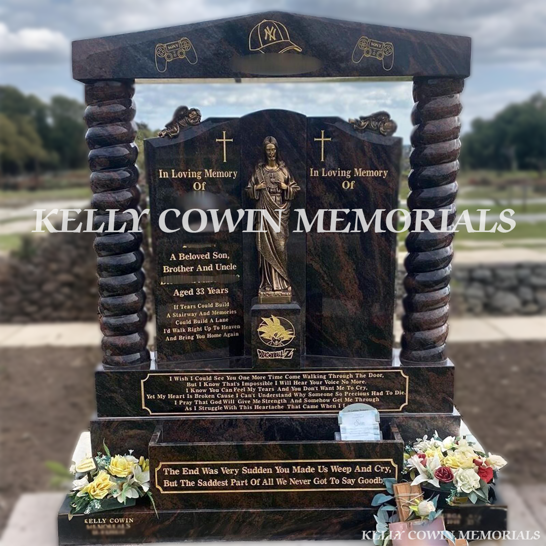 Front view of Pandora Gates of Heaven headstone with cap and pillars in Balgriffin Cemetery Dublin
