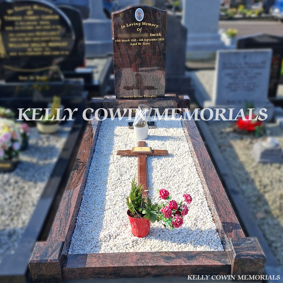 Front view of Pandora granite OG headstone with gold leaf inscription in Calvary Cemetery
