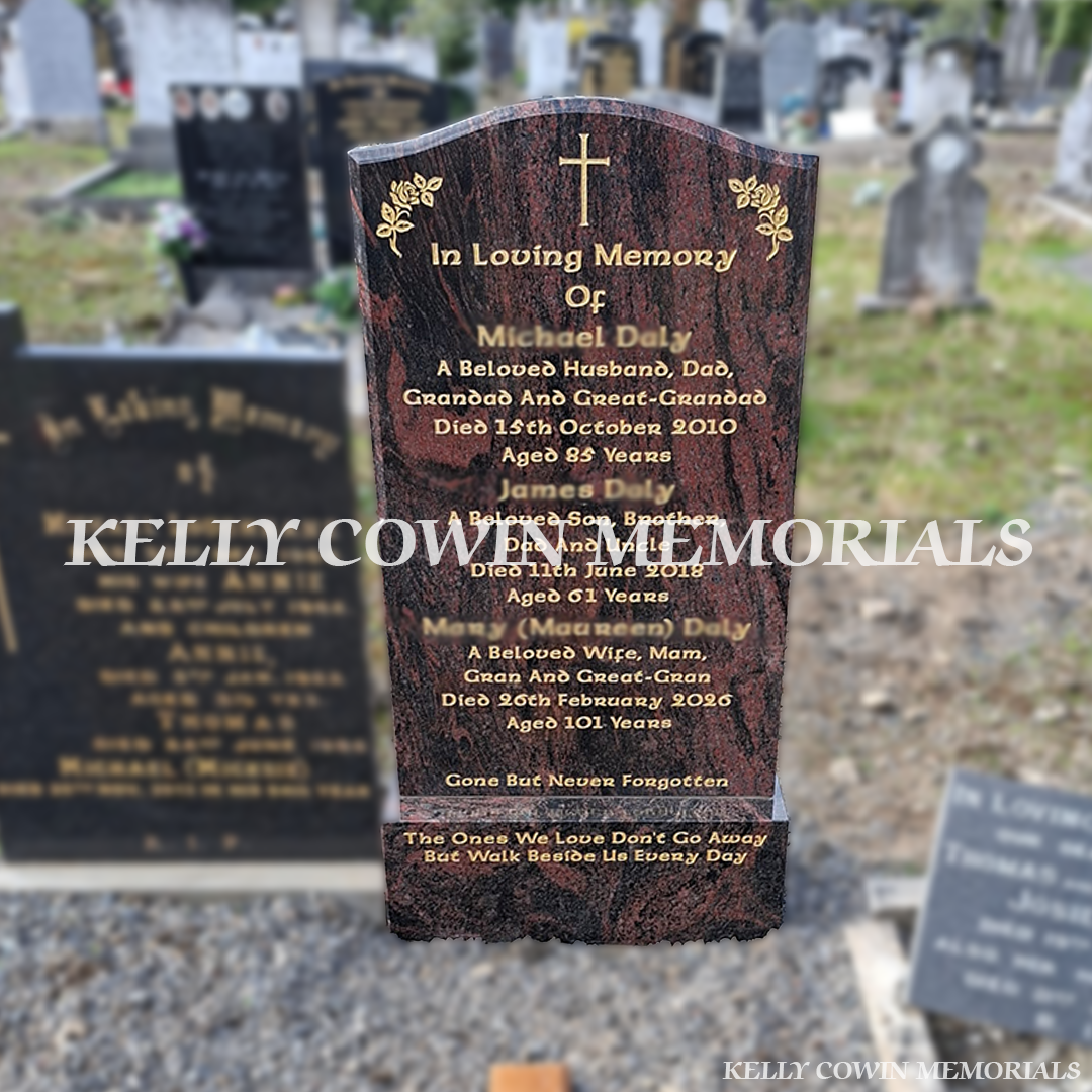 Pandora granite OG headstone with natural red and black granite patterns, gold engraved inscription, cross and floral details, matching granite base in Glasnevin Cemetery, Dublin, by Kelly Cowin Memorials.