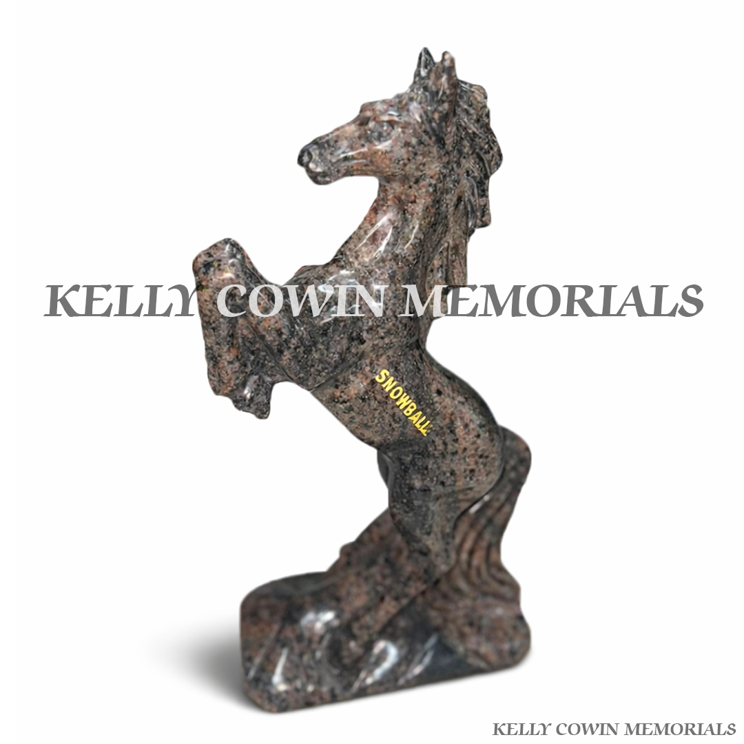 Close-up of gold engraved wording on Pandora granite horse statues