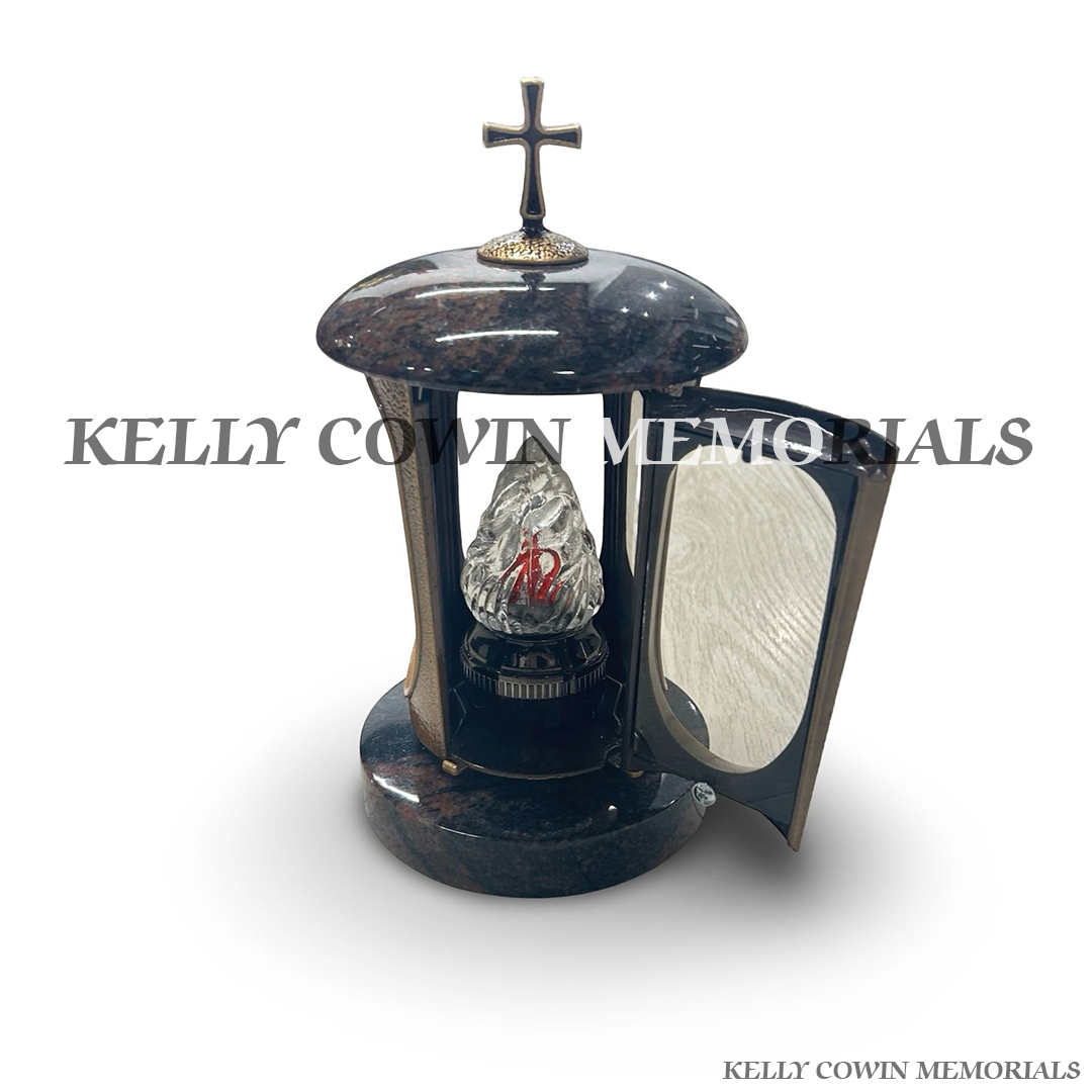 Front view of Pandora granite lantern with bronze cross detail