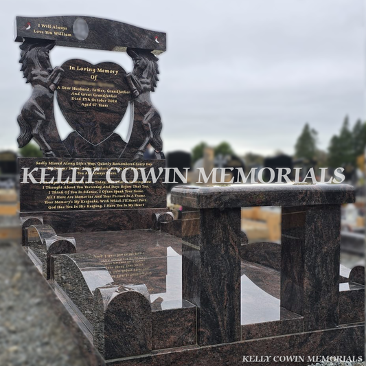 Side view of Pandora granite horse heart headstone showing curved kerbing and polished granite base — Kelly Cowin Memorials.