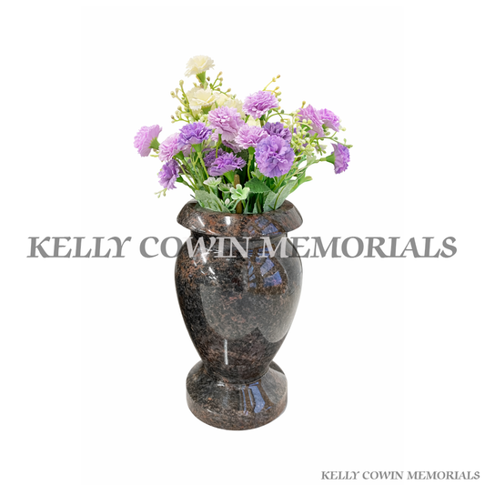 Pandora tall granite memorial vase with artificial flowers on headstone – classic graveside flower holder available locally and nationwide in Ireland.
