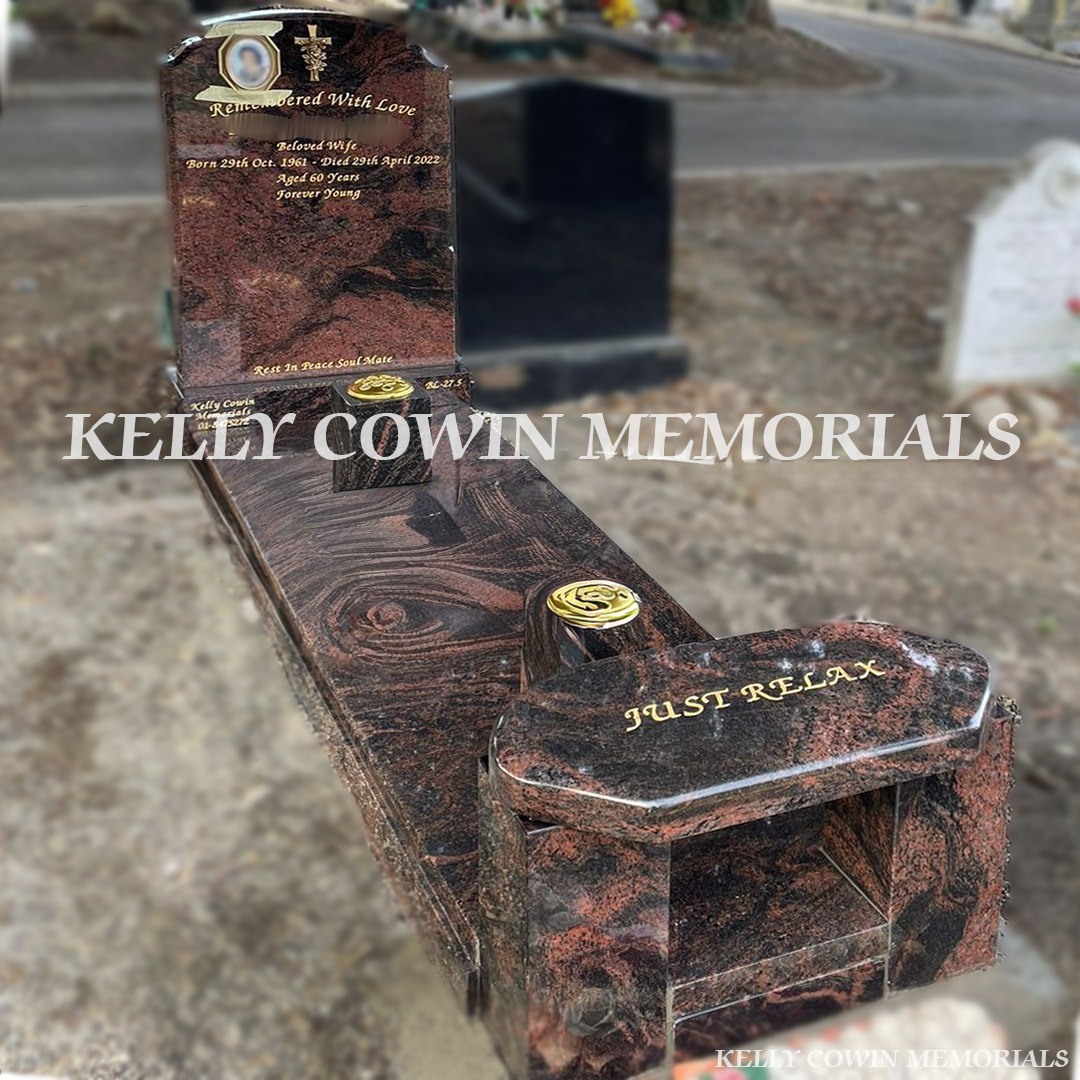 Side view of Pandora Top Nine memorial showing kerbing, slab, bench and accessories in Glasnevin Cemetery