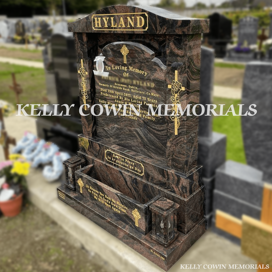 Side view of Pandora Top Nine headstone showing pillars, backing plate and lanterns in Balgriffin Cemetery