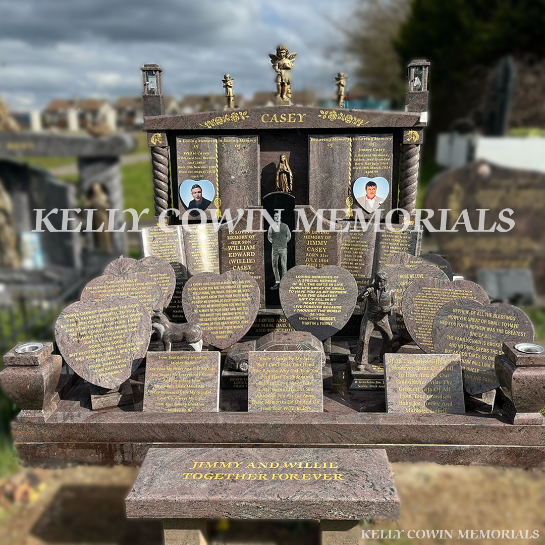 Paradiso granite double book Traveller headstone with statues, gold leaf inscription and heart plaques in Mount St Oliver Cemetery, Limerick