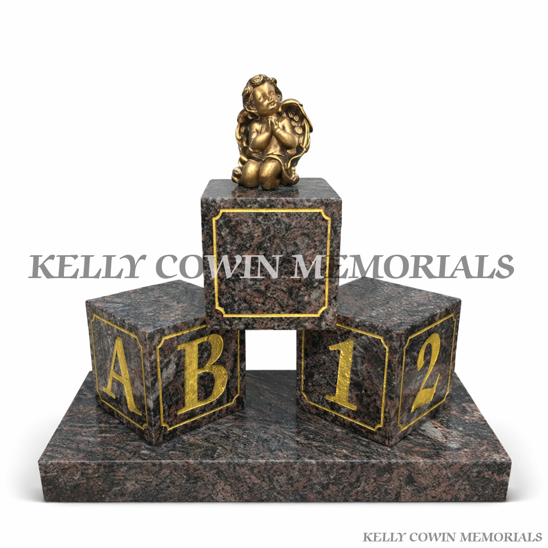 Paradiso granite baby blocks memorial grave accessory with angel figure and gold engraved lettering Ireland
