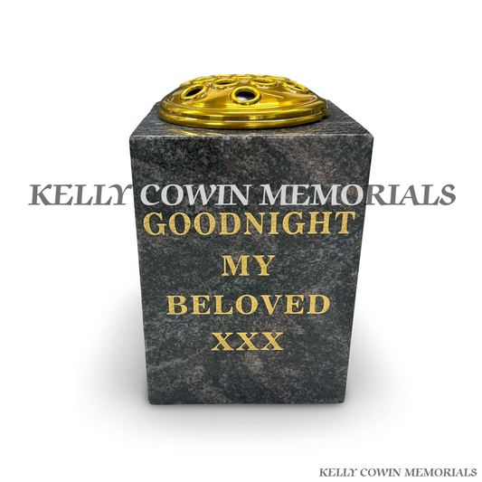 Front view of Paradiso granite square vase with gold lid and gold inscription