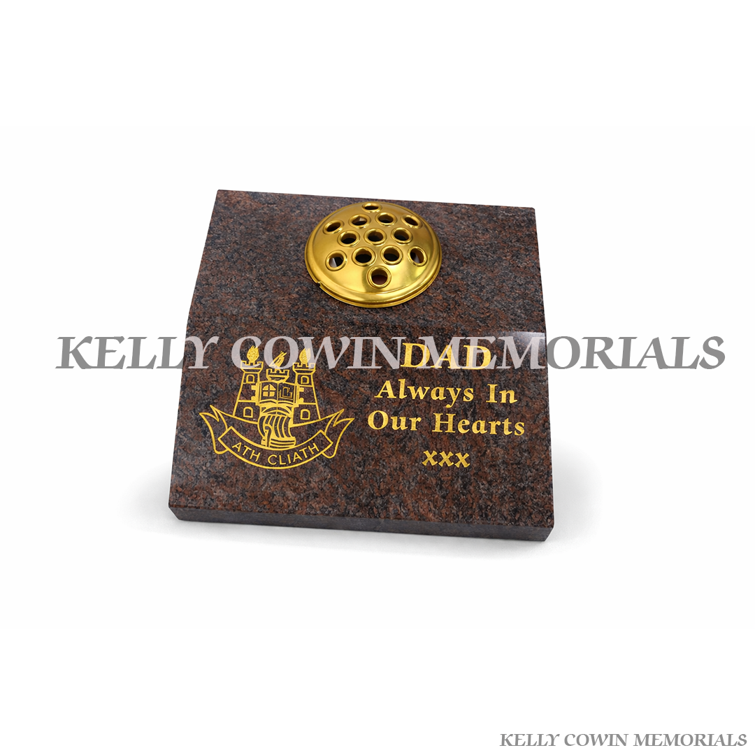 Paradiso granite sloped memorial vase with gold lettering, Dublin crest engraving and gold flower holder lid Ireland