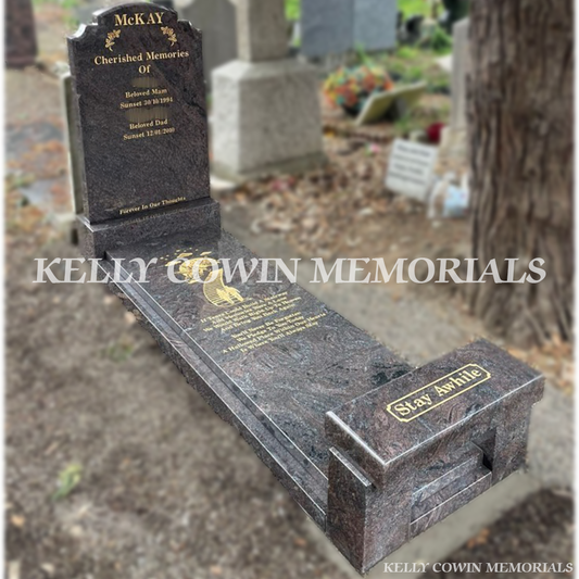 Paradiso Top Nine shaped headstone with full slab and kerbing in Glasnevin Cemetery