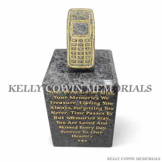 Granite phone memorial ornament on engraved granite block grave accessory by Kelly Cowin Memorials Ireland