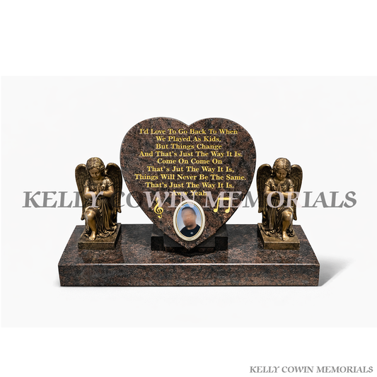 12 inch granite heart memorial with statues on plinth, made in Ireland. Weather-resistant tribute. Local service with nationwide delivery.