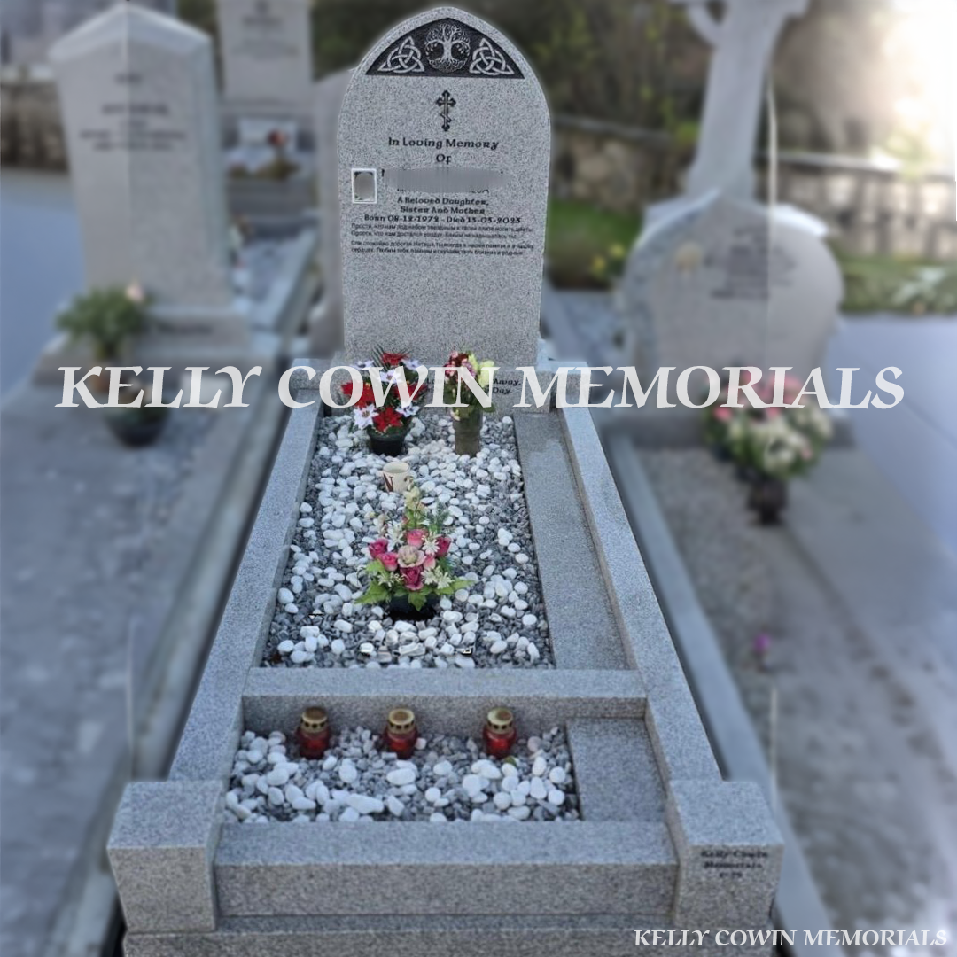 Front view of custom grey granite pointed headstone with black inscription in Balrothery Cemetery