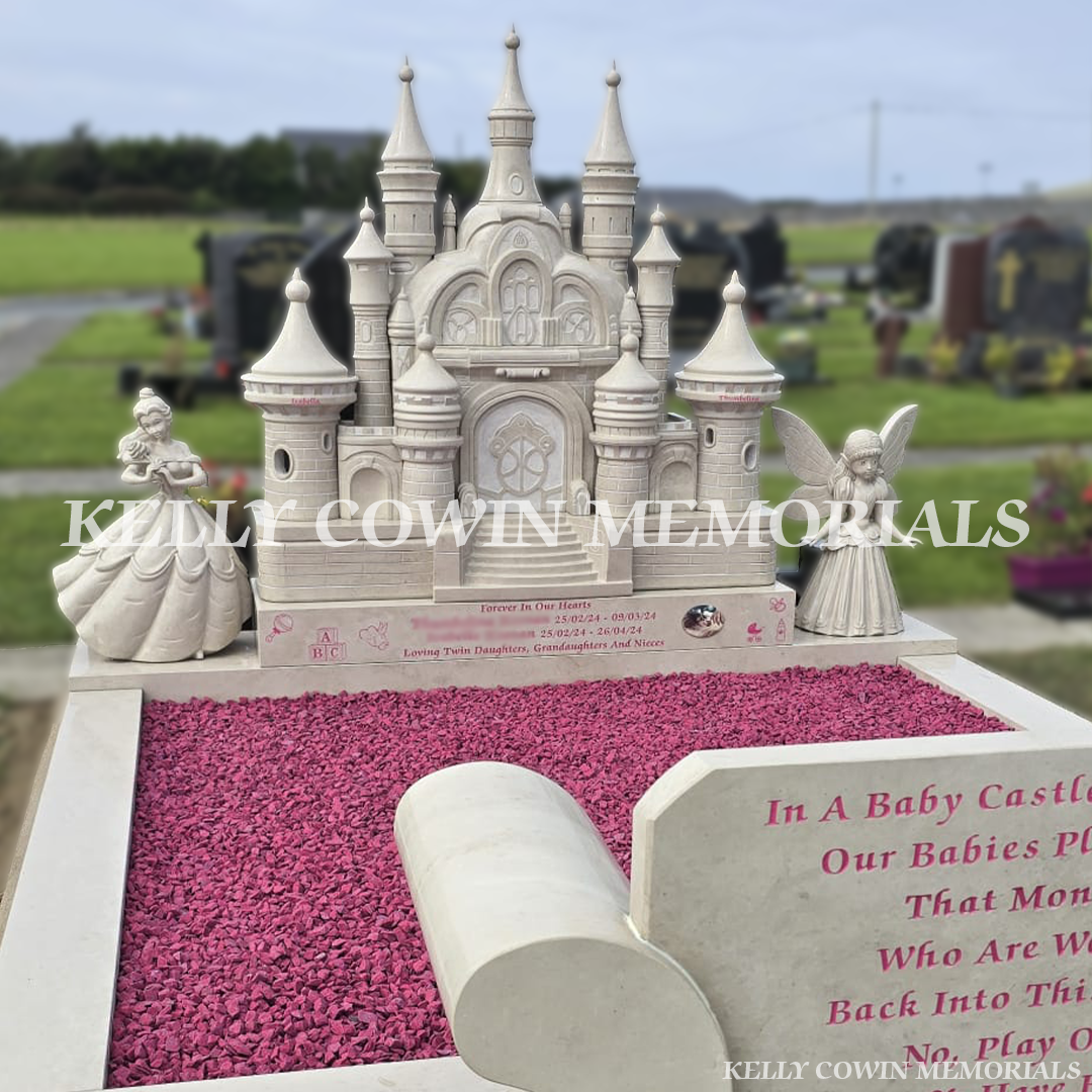 Side angle of children’s princess castle memorial with fairy and princess statues in County Clare.