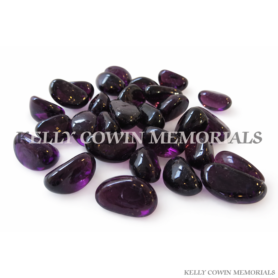 Purple glass pebbles for grave memorial supplied in Dublin by Kelly Cowin Memorials with nationwide delivery across Ireland.