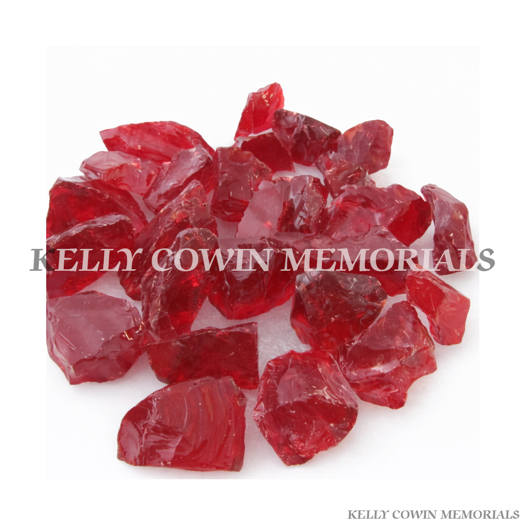 Red decorative glass chippings for grave memorial supplied in Dublin by Kelly Cowin Memorials with nationwide delivery across Ireland.