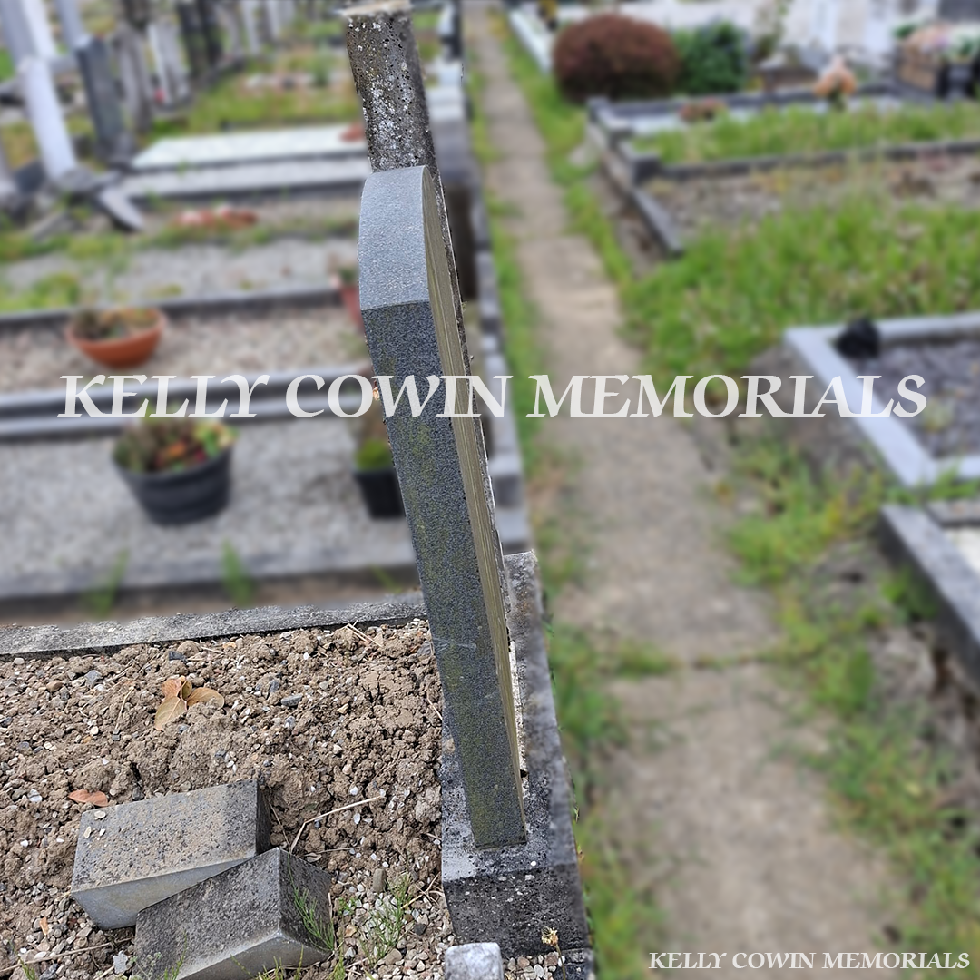 Before renovation of black granite and limestone memorial in Balgriffin Cemetery