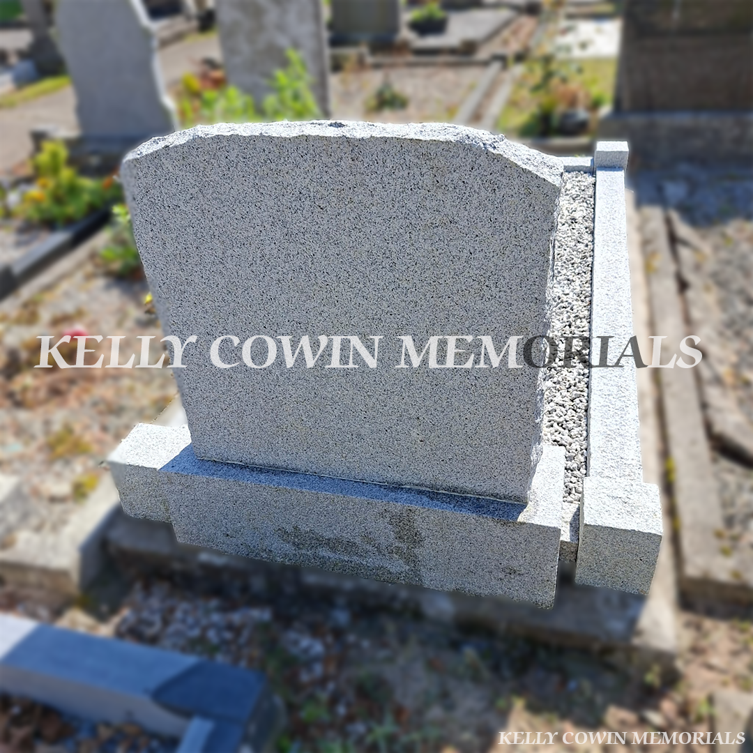 After renovation of restored granite boulder headstone and limestone kerbing in Lusk Cemetery