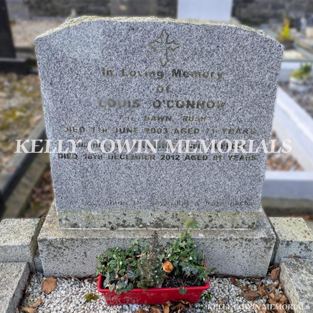 Before renovation of grey granite boulder memorial in Lusk Cemetery