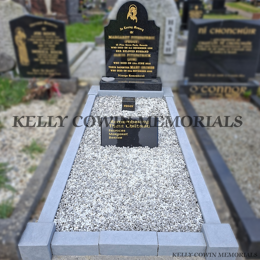After renovation of restored limestone kerbing and refreshed grave plot