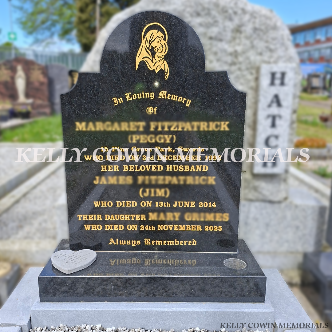 After renovation of restored limestone kerbing and refreshed grave plot