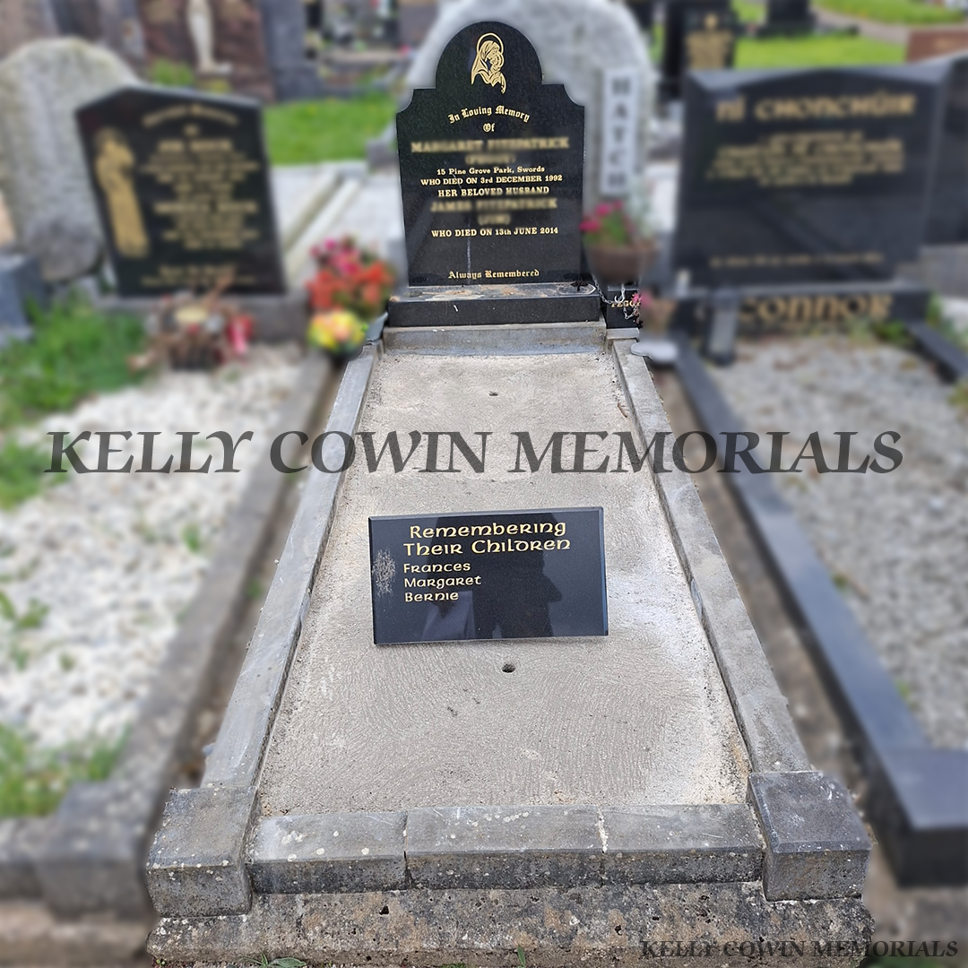 Before renovation of memorial and limestone kerbing in Swords Cemetery
