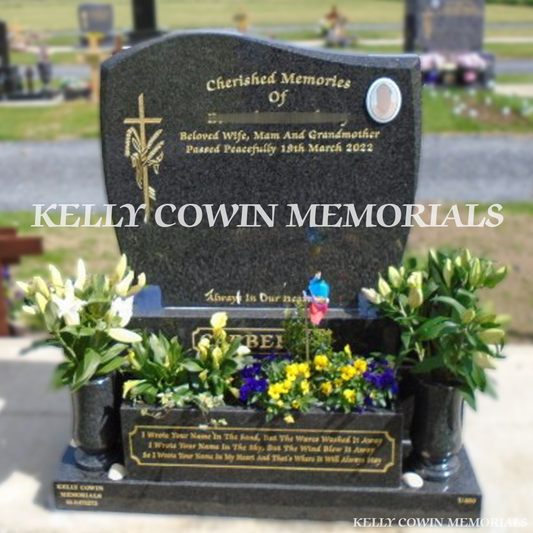 Front view of Rustenburg C1 headstone with flower box erected in Balgriffin Cemetery Dublin by Kelly Cowin Memorials