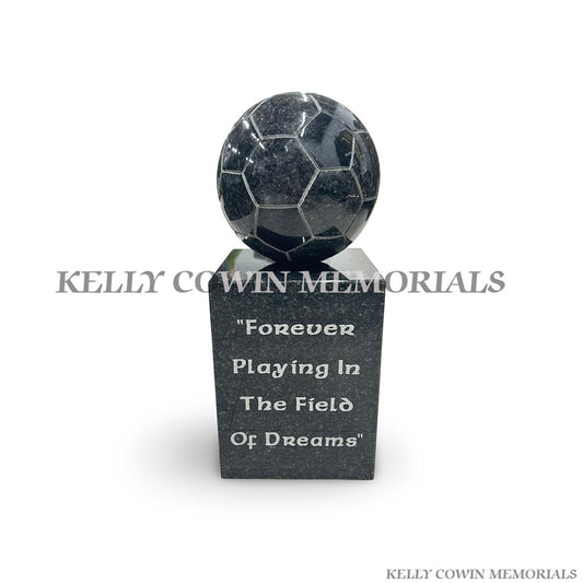 Front view of Rustenburg granite football memorial on matching granite block