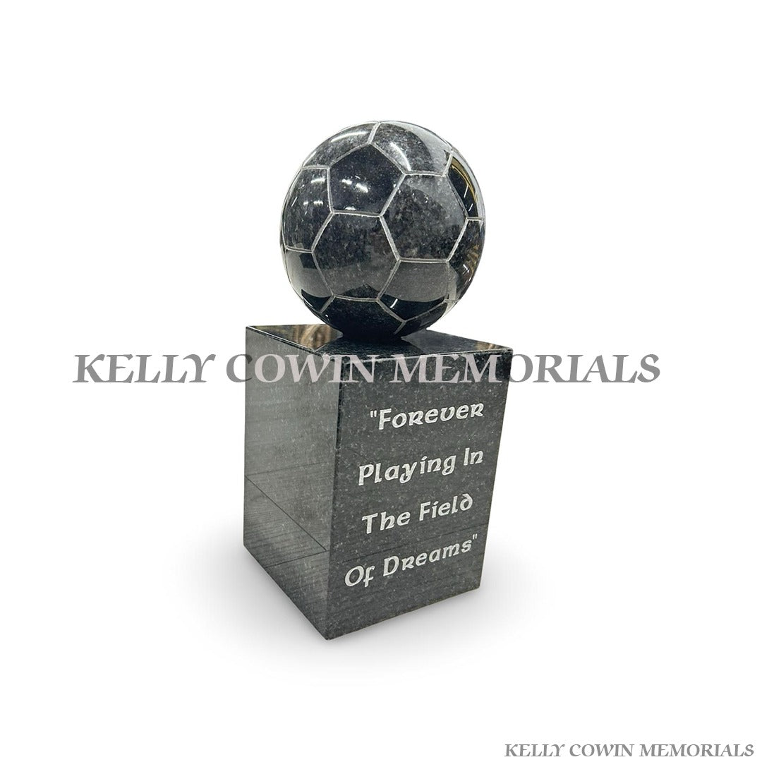 Side view of Rustenburg granite football ornament with silver lettering