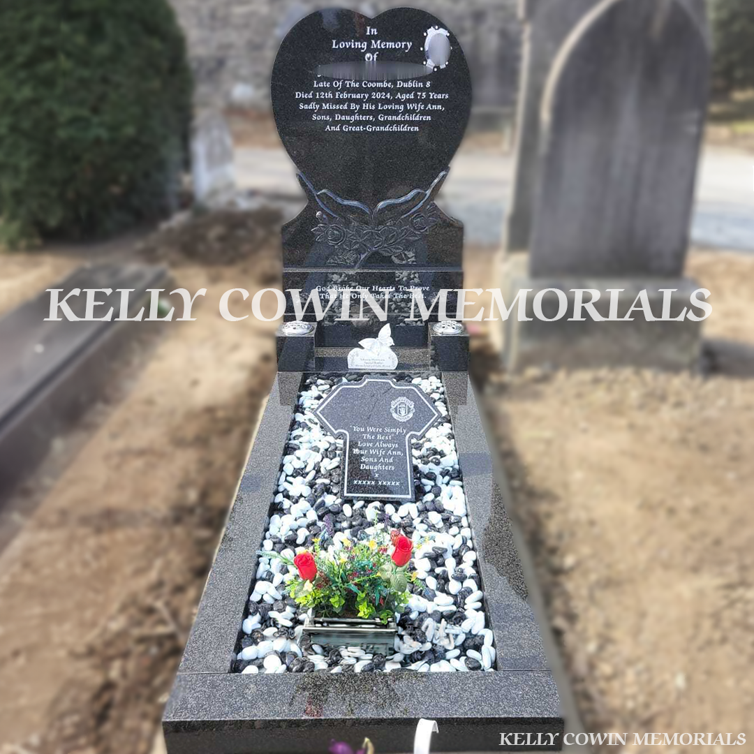 Front view of Rustenburg granite heart-shaped headstone with silver inscription in Mount Jerome Cemetery
