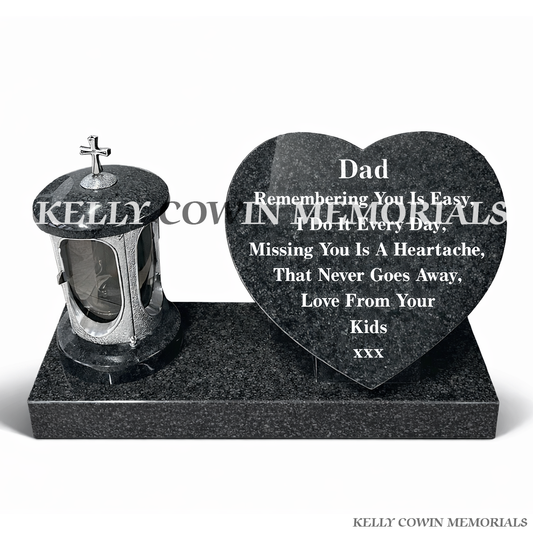 Front view of silver cross lantern with Rustenburg granite heart and inscription