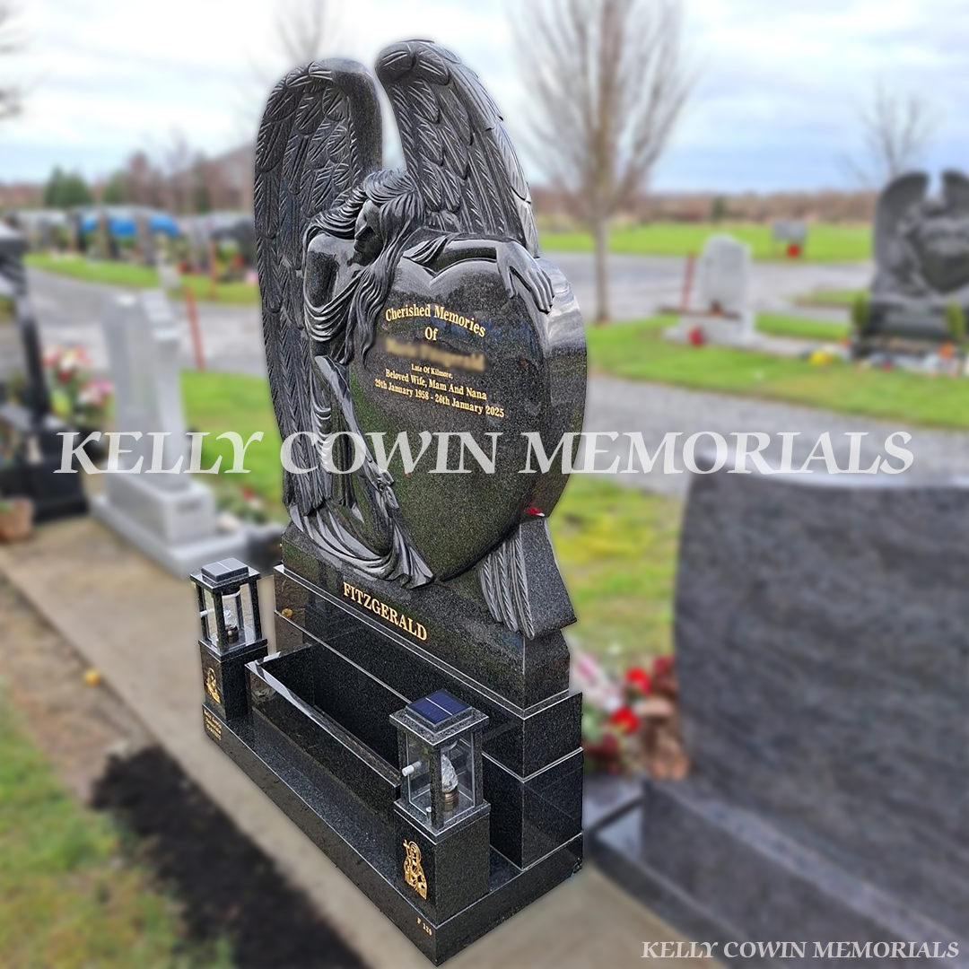 “Side view of angel heart memorial with solar lanterns and gold lettering by Kelly Cowin Memorials Dublin”