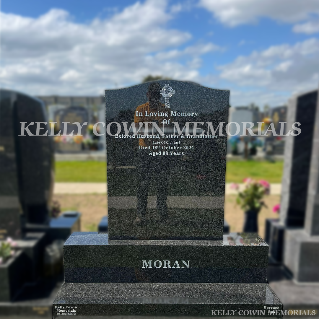 Rustenburg granite og headstone on base and plinth in Balgriffin Cemetery, Dublin