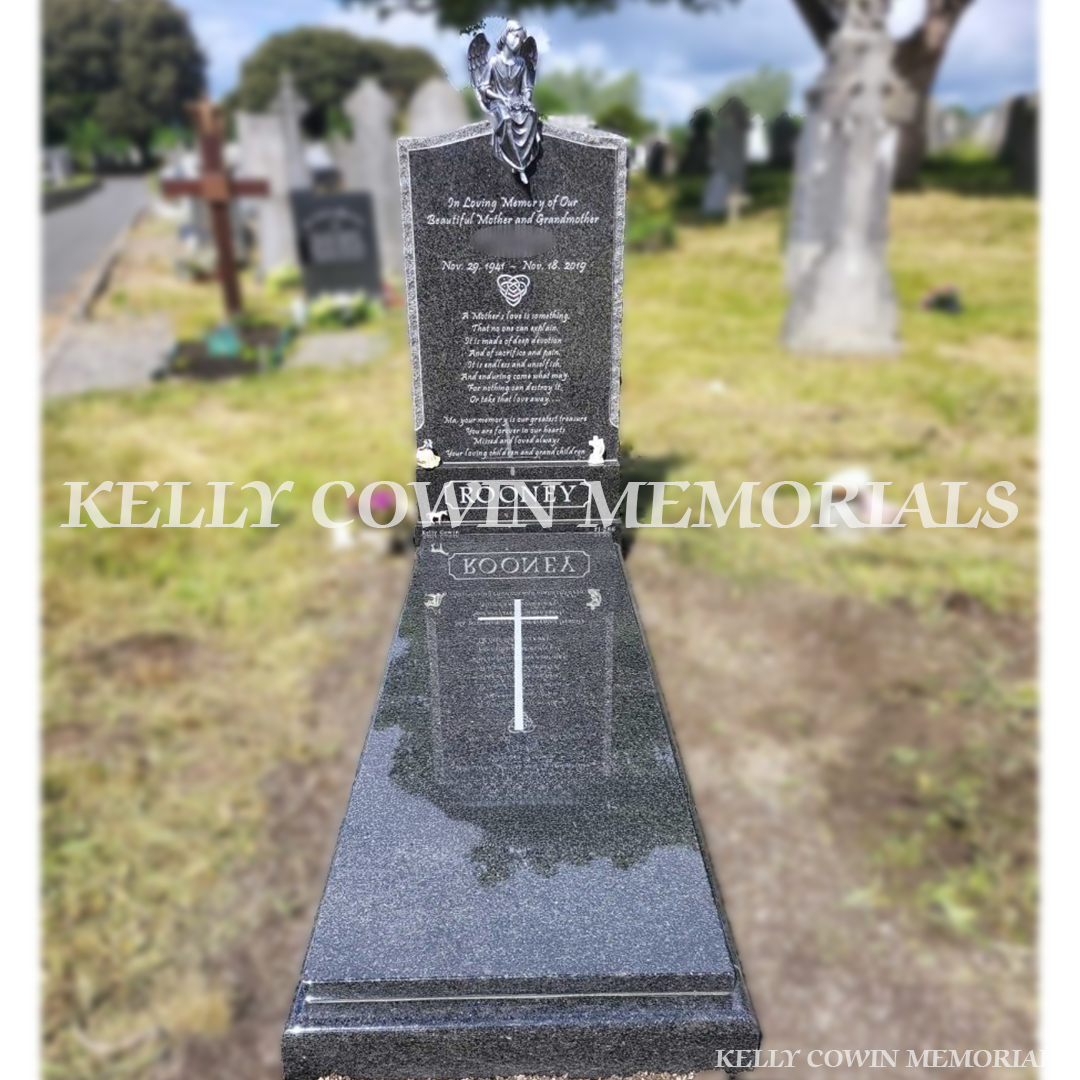 Rustenburg OG granite headstone with rough edges and full-length cover slab installed in Glasnevin Cemetery by Kelly Cowin Memorials.