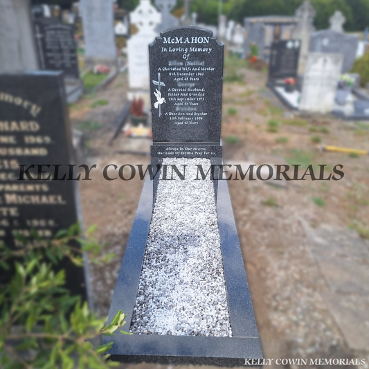 Rustenburg Top Nine granite headstone with base, full grey granite kerbing, white Moldovan chippings and silver inscription installed in Glasnevin Cemetery Dublin by Kelly Cowin Memorials.