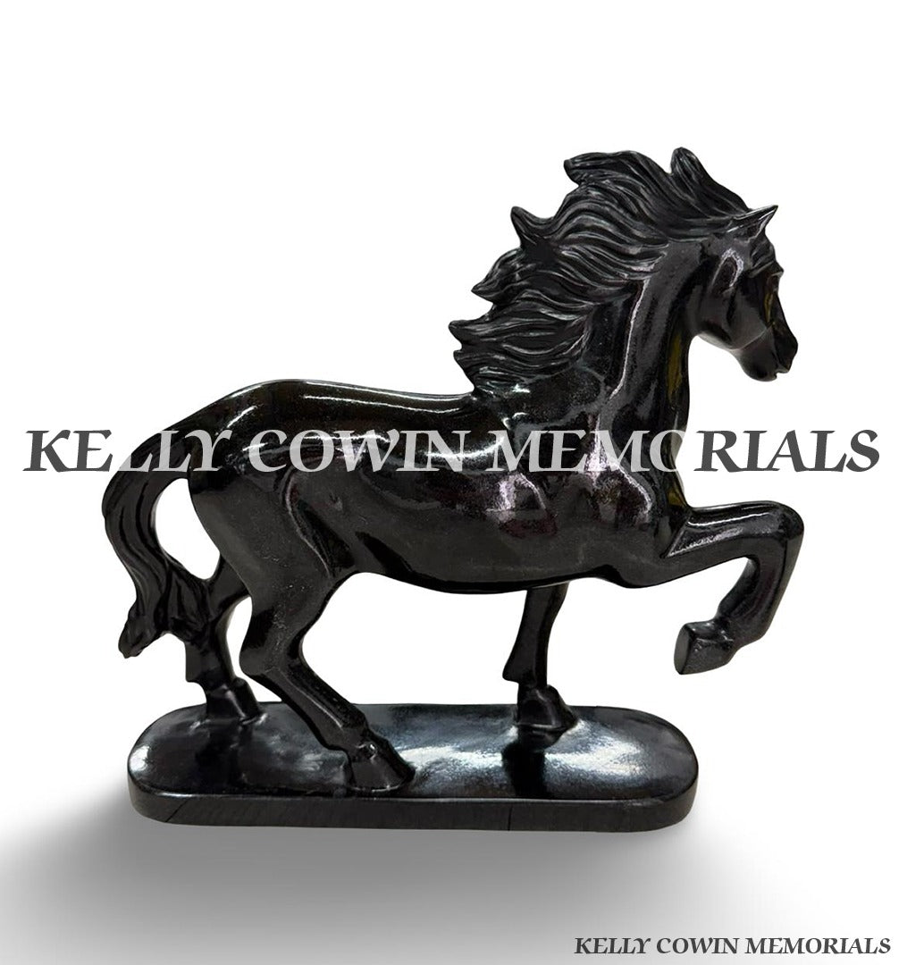 side view of  a Black granite horse memorial ornaments available from Kelly Cowin Memorials in Ireland.