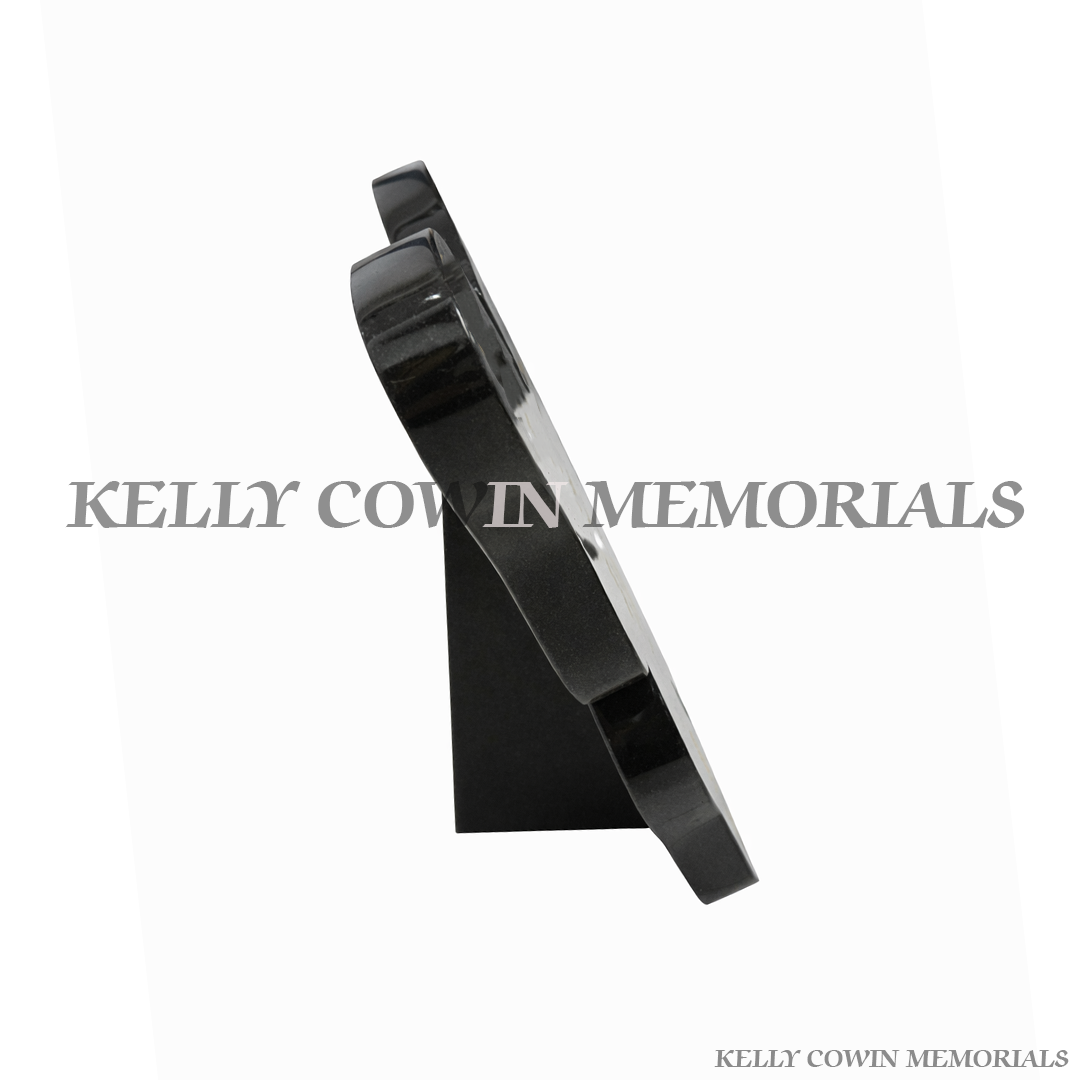 Black granite butterfly side view memorial plaque with engraved detailing by Kelly Cowin Memorials Ireland, available locally and nationwide.