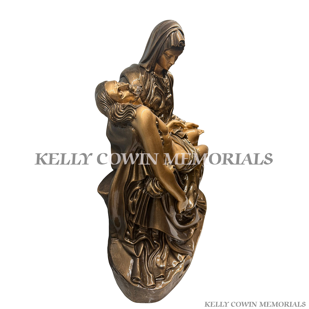 Bronze Pietà memorial statue featuring Our Lady holding Jesus for graves and headstones by Kelly Cowin Memorials Dublin Ireland with nationwide memorial services
