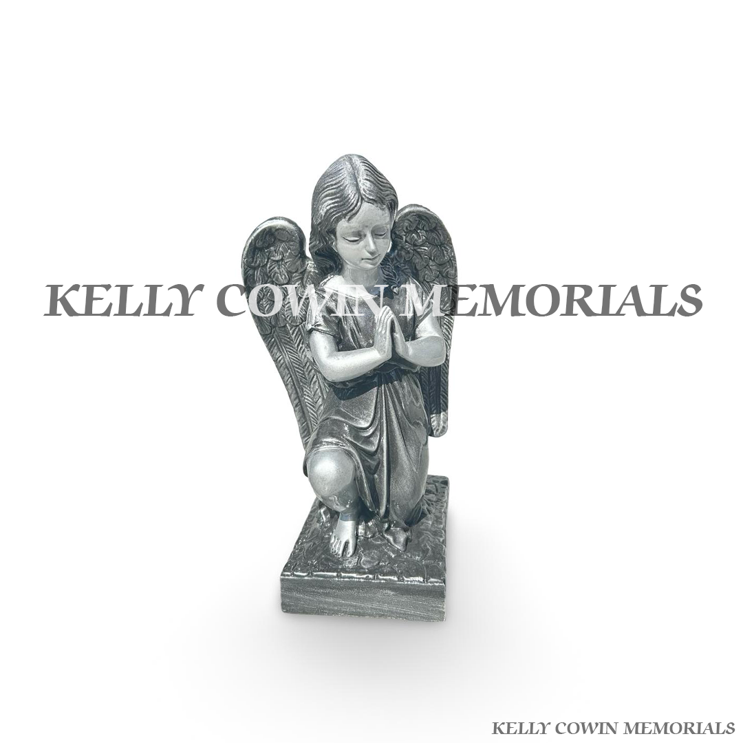 Front view of silver kneeling angel memorial statues